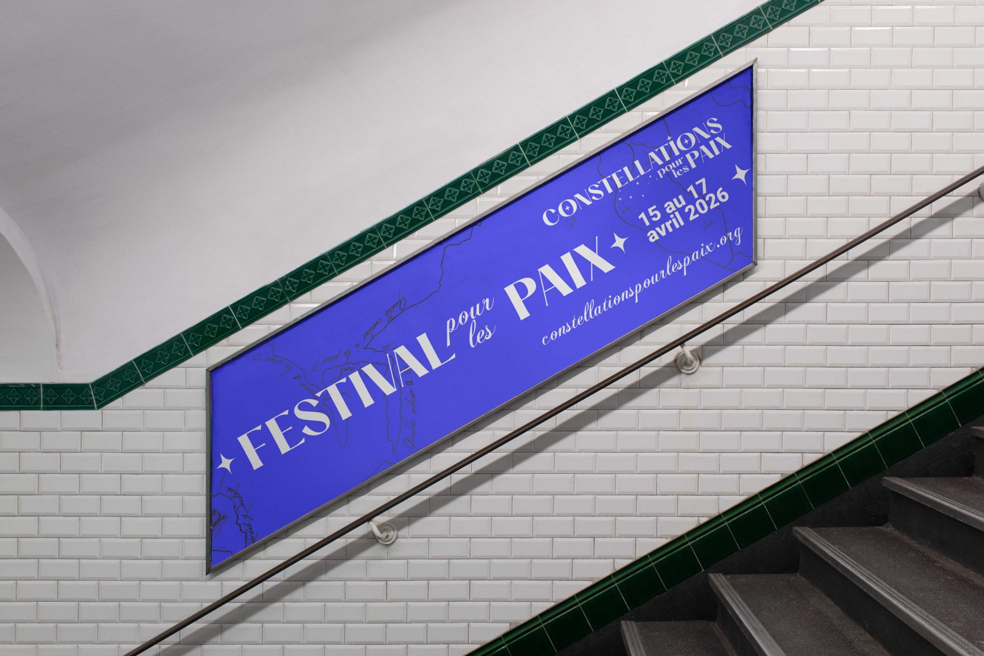 Festival poster in a metro stairway