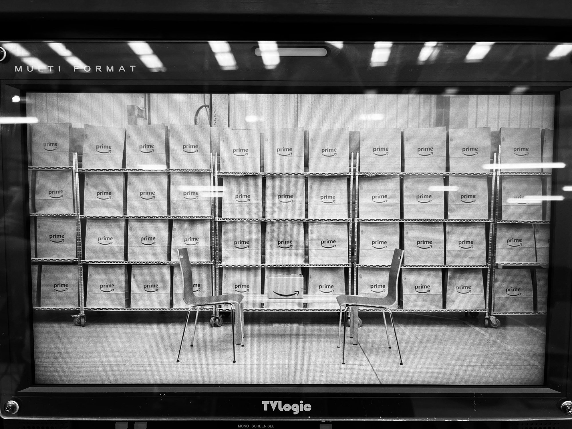 Black and white photo of a set lined with Prime bags