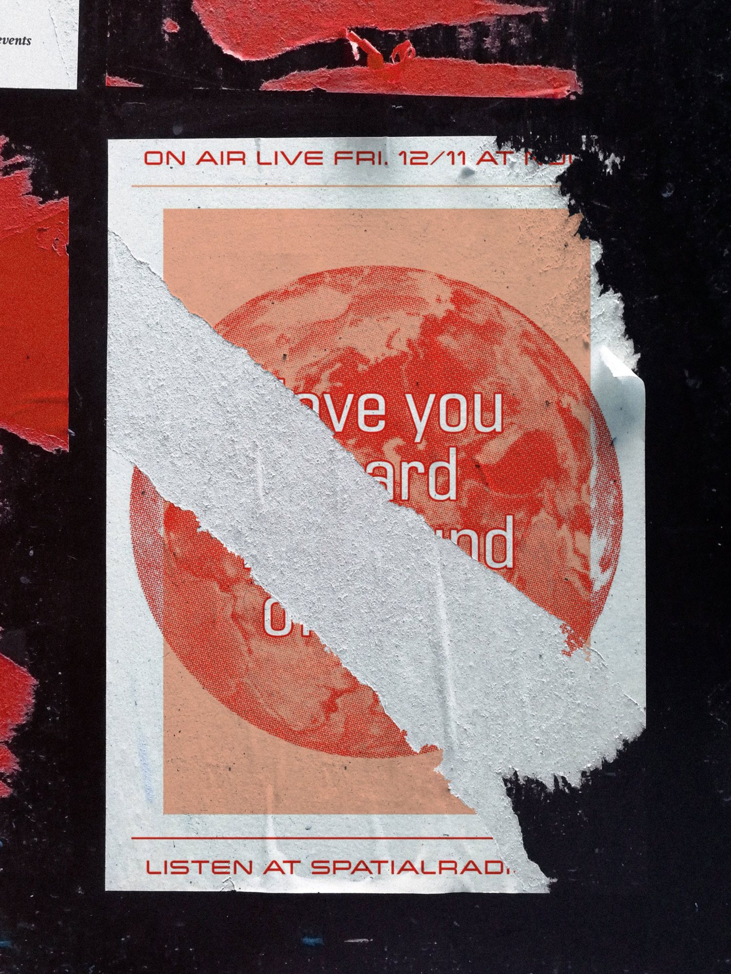 A torn ZERO poster